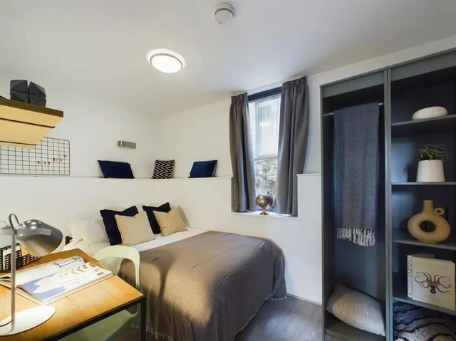 Bed desk globe and closet bedroom at 5 Bedroom House at Flat 4, 18, China Street in Lancaster Student Accommodation