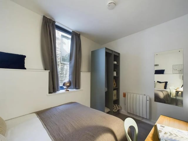 Bed wardrobe radiator mirror bedroom at 5 Bedroom House at Flat 4, 18, China Street in Lancaster Student Accommodation