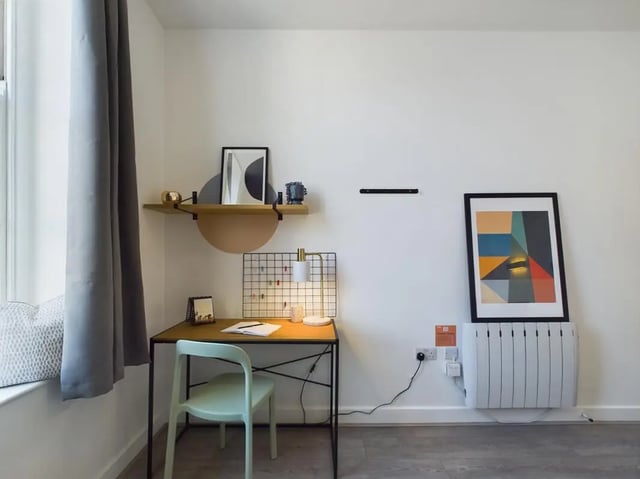 Desk chair lamp art on wall study area at 5 Bedroom House at Flat 4, 18, China Street in Lancaster Student Accommodation