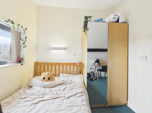 Bed wardrobe and desk with chair bedroom at 4 Bedroom House at Flat 9, 18, China Street in Lancaster Student Accommodation
