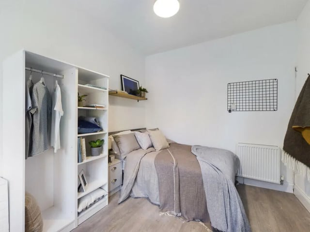 Closet bed side table shelf linens bedroom at 12 Bedroom House at 66, Upper Allen Street in Sheffield Student Accommodation