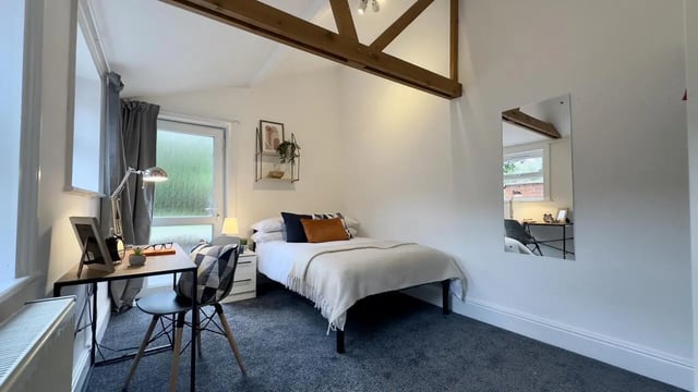 Bed desk chair and mirror Bedroom at 6 Bedroom House at 214, West Parade in Lincoln Student Accommodation