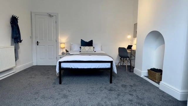 Bed desk chair and basket Bedroom at 6 Bedroom House at 214, West Parade in Lincoln Student Accommodation