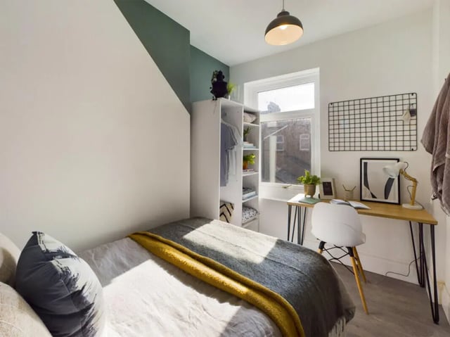 Bed closet desk and chair bedroom at 6 Bedroom House at 6, Milking Stile Lane in Lancaster Student Accommodation