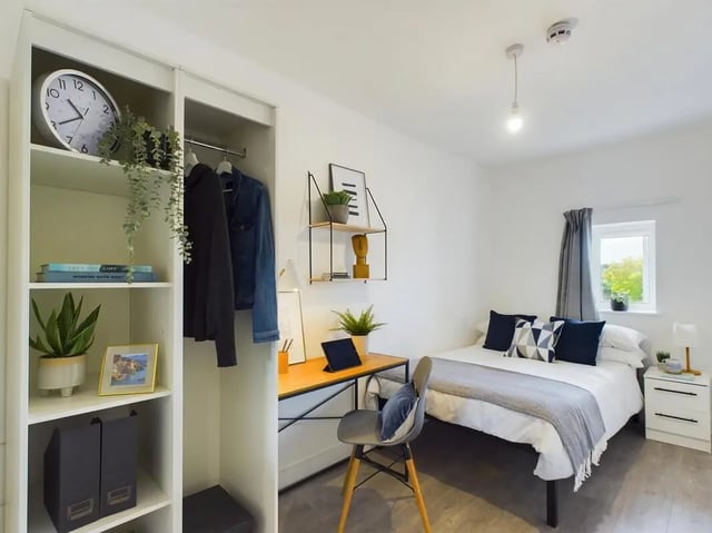 Bed with desk and closet bedroom at 8 Bedroom House at 69, Monks Road in Lincoln Student Accommodation
