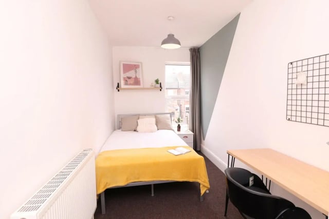 Bed radiator shelf art and desk bedroom at 5 Bedroom House at 43, Thesiger Street in Lincoln Student Accommodation