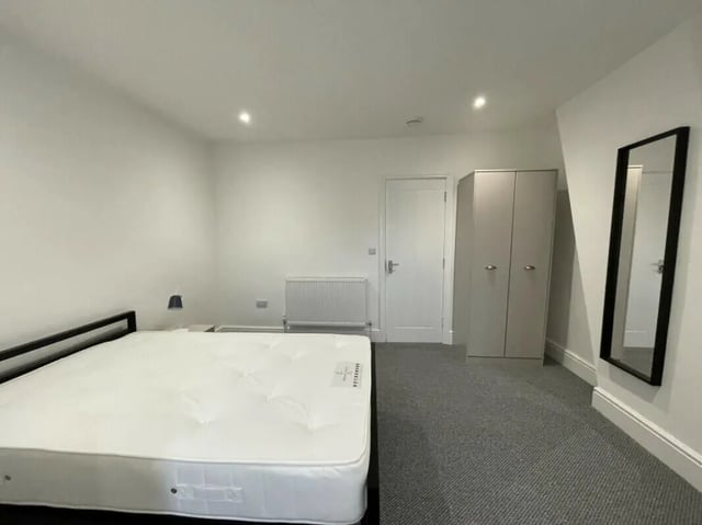 Mattress radiator door wardrobe mirror bedroom at 2 Bedroom House at 20 A, Portland Street in Lincoln Student Accommodation