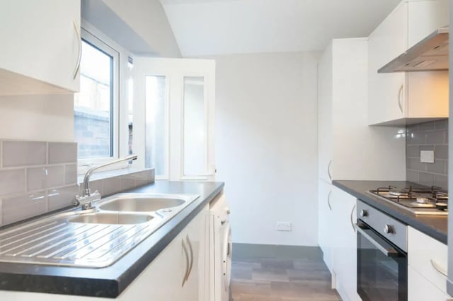 Sink washing machine oven and cabinets kitchen at 3 Bedroom House at 1, Romney Street in Salford Student Accommodation
