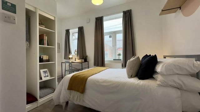 Bed desk shelves and window bedroom at 3 Bedroom House at 25, Romney Street in Salford Student Accommodation