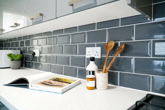 Book plant microwave bottle spoons kitchen counter area kitchen at 4 Bedroom House at 44, Mount Street in Lincoln Student Accommodation