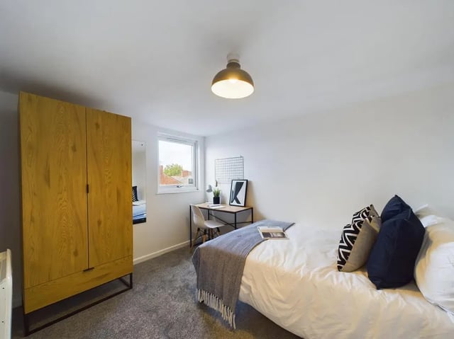 Wardrobe desk bed and pillows bedroom at 7 Bedroom House at 6, KIPPAX STREET in Manchester Student Accommodation