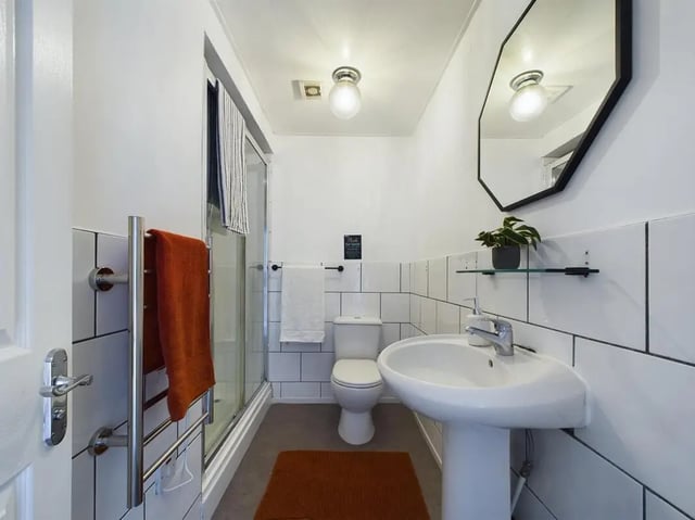 Sink toilet shower towel rack mirror bathroom at 7 Bedroom House at 6, KIPPAX STREET in Manchester Student Accommodation