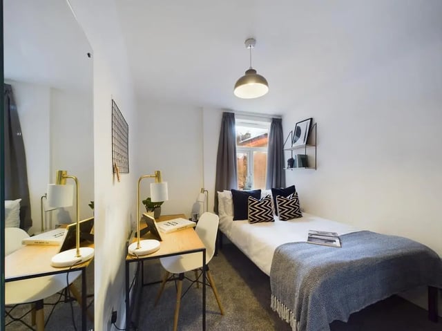Bed desk chair lamps and mirror bedroom at 7 Bedroom House at 6, KIPPAX STREET in Manchester Student Accommodation