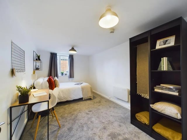 Bed desk shelving and bed bedroom at 7 Bedroom House at 6, KIPPAX STREET in Manchester Student Accommodation