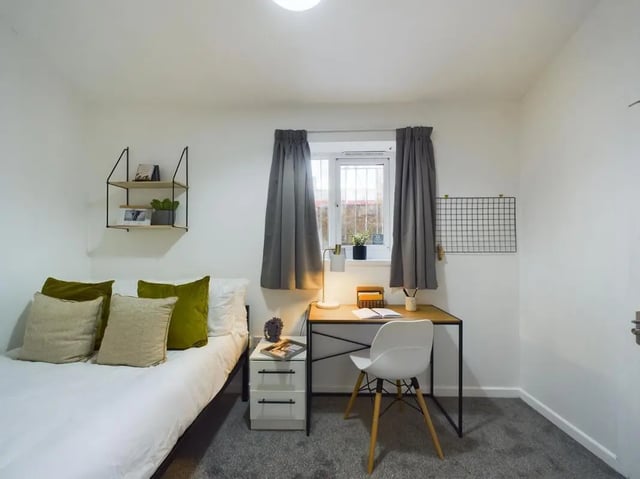 Bed desk shelf and window student bedroom at 7 Bedroom House at 6, KIPPAX STREET in Manchester Student Accommodation