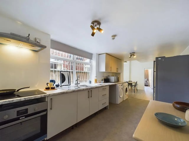 Oven hob sink cabinets and washing machines kitchen at 7 Bedroom House at 6, KIPPAX STREET in Manchester Student Accommodation