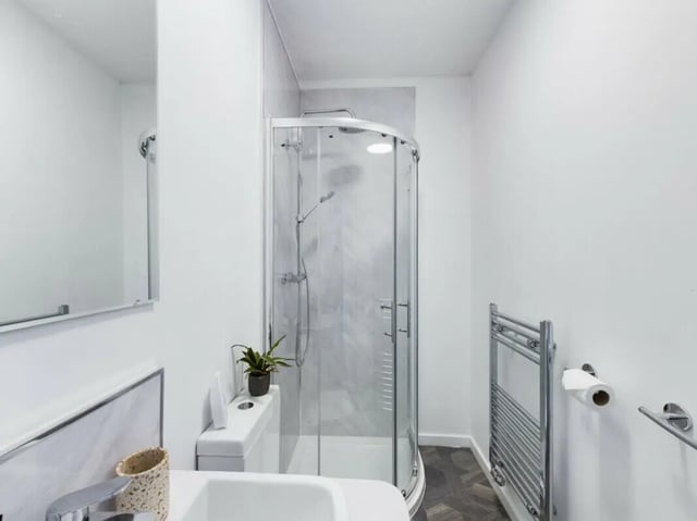 Sink toilet shower plant towel rack bathroom at 7 Bedroom House at 3, Ruskin Avenue in Manchester Student Accommodation