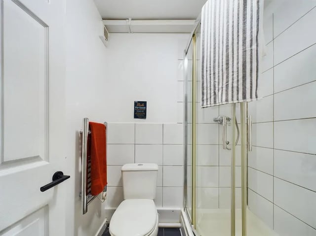 Toilet towel rail shower screen bathroom at 4 Bedroom House at Flat 1, 58, Ruskin Avenue in Manchester Student Accommodation
