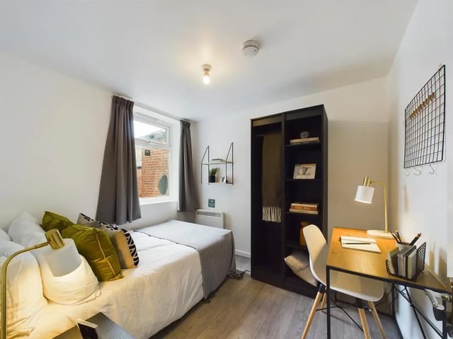 Bed wardrobe desk with chair bedroom at 4 Bedroom House at Flat 1, 58, Ruskin Avenue in Manchester Student Accommodation