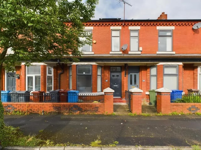Red brick terraced houses with windows and doors Exterior at 6 Bedroom House at 174, ACOMB STREET in Manchester Student Accommodation