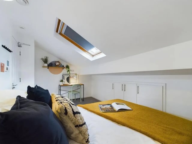 Bed pillows desk and skylight bedroom at 6 Bedroom House at 174, ACOMB STREET in Manchester Student Accommodation