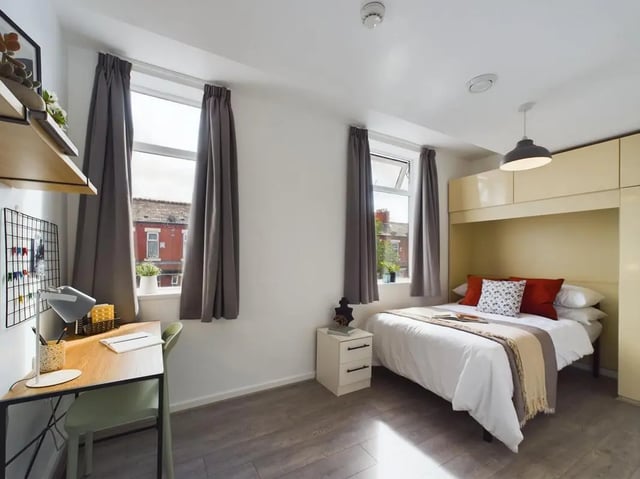 Bed desk bedside table wardrobe bedroom at 6 Bedroom House at 174, ACOMB STREET in Manchester Student Accommodation