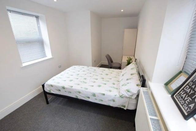 Bed desk chair wardrobe and radiator bedroom at 10 Bedroom House at 15, Monks Road in Lincoln Student Accommodation