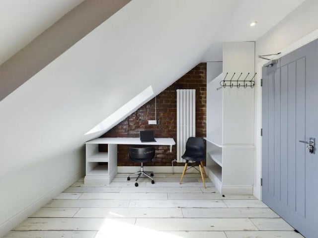 Desk laptop chairs radiator coat rack study area at 8 Bedroom House at 211, Molyneux Road in Liverpool Student Accommodation