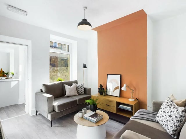 Sofa coffee table media unit living room at 5 Bedroom House at 17, Gladstone Terrace in Lancaster Student Accommodation