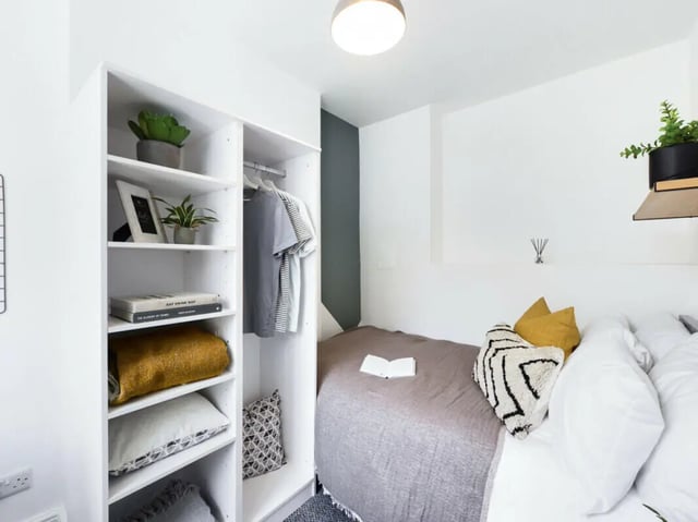 Shelving closet bed with cushions and plants bedroom at 5 Bedroom House at 17, Gladstone Terrace in Lancaster Student Accommodation