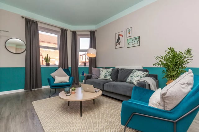 Sofa armchair coffee table rug living room at 5 Bedroom House at 64, Monson Street in Lincoln Student Accommodation
