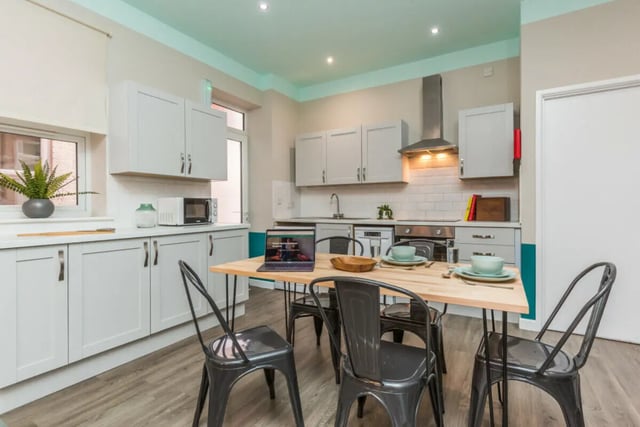 Kitchen with dining table and laptop kitchen area at 5 Bedroom House at 64, Monson Street in Lincoln Student Accommodation
