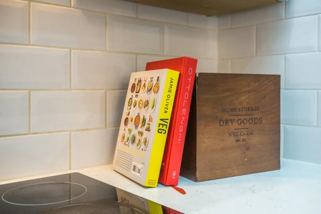 Cookbooks on shelf with wooden dry goods box kitchen at 5 Bedroom House at 64, Monson Street in Lincoln Student Accommodation