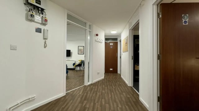 Keys on wall through doorway living room hallway at 4 Bedroom House at 17, Brookside in Derby Student Accommodation