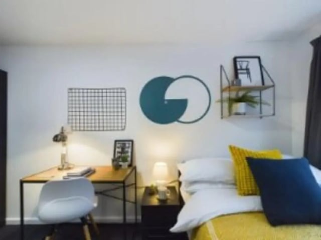 Desk chair lamp and bed Bedroom at 4 Bedroom House at 17, Brookside in Derby Student Accommodation