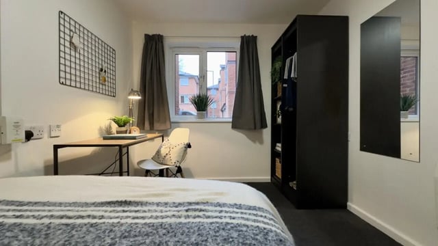 Bed desk chair wardrobe mirror bedroom at 3 Bedroom House at 20, Brookside in Derby Student Accommodation