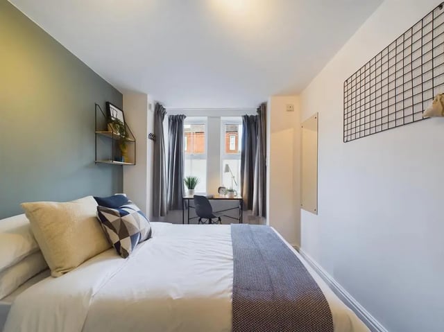 Bed desk chair and window bedroom at 4 Bedroom House at 75, West Parade in Lincoln Student Accommodation