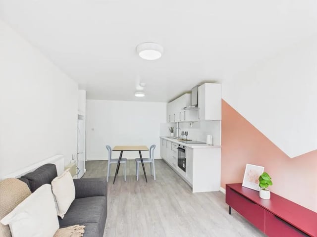 Sofa kitchen table chairs cabinets living room kitchen at 1 Bedroom House at Flat 5, Grove Street Studios, The Groves in Liverpool Student Accommodation