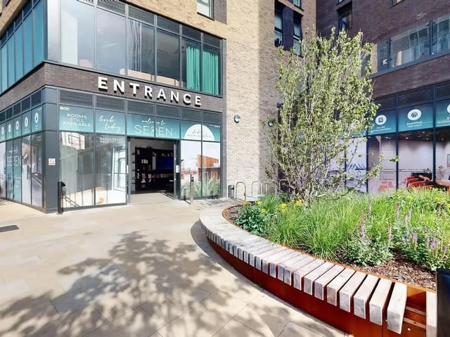 Entrance with library and planters exterior at SEREN in Swansea Student Accommodation