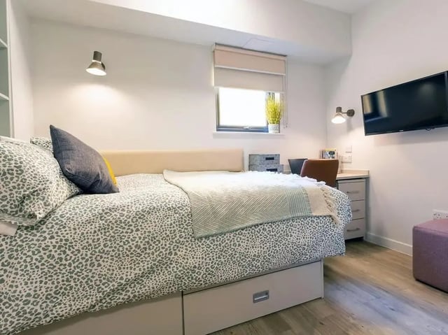 Bed desk TV and ottoman bedroom at SEREN in Swansea Student Accommodation