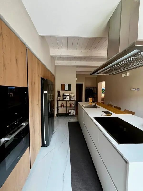 Modern kitchen with island ovens and refrigerator kitchen at Welcoming double ensuite bedroom near the Vezzano Ligure train station in La Spezia Student Accommodation
