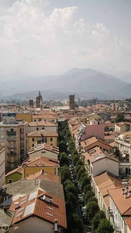 Row of buildings and trees exterior at Welcoming 2-bedroom apartment near the Albenga train station in Albenga Student Accommodation