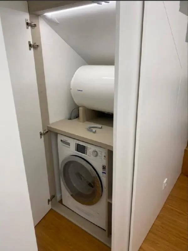 Washer water heater built in closet laundry area at Luxury 1 Bedroom Apartment close to  Polytechnic Institute of Viana do Castelo in Viana Do Castelo Student Accommodation