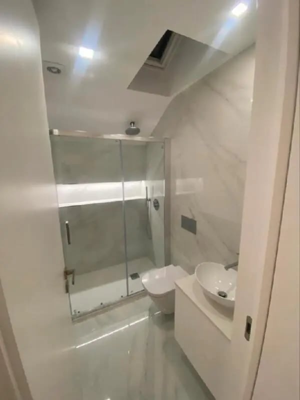 Shower toilet sink vanity bathroom at Luxury 1 Bedroom Apartment close to  Polytechnic Institute of Viana do Castelo in Viana Do Castelo Student Accommodation