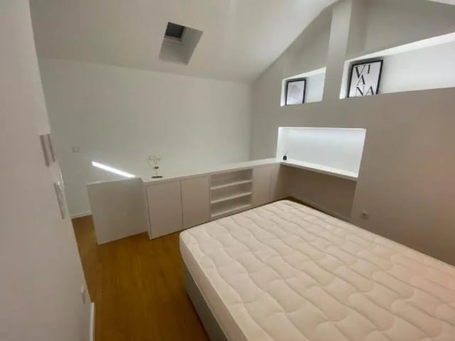 Bed mattress with built-in shelving and desk bedroom at Luxury 1 Bedroom Apartment close to  Polytechnic Institute of Viana do Castelo in Viana Do Castelo Student Accommodation