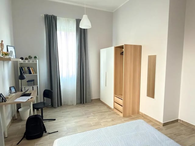 Desk, chair, wardrobe, bed, bedroom at Amazing single room in Pescara in Pescara Student Accommodation