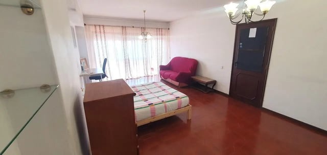 Bed desk chair sofa dresser bed living room at Double Bedroom close to Minho University 3 in Guimaraes Student Accommodation