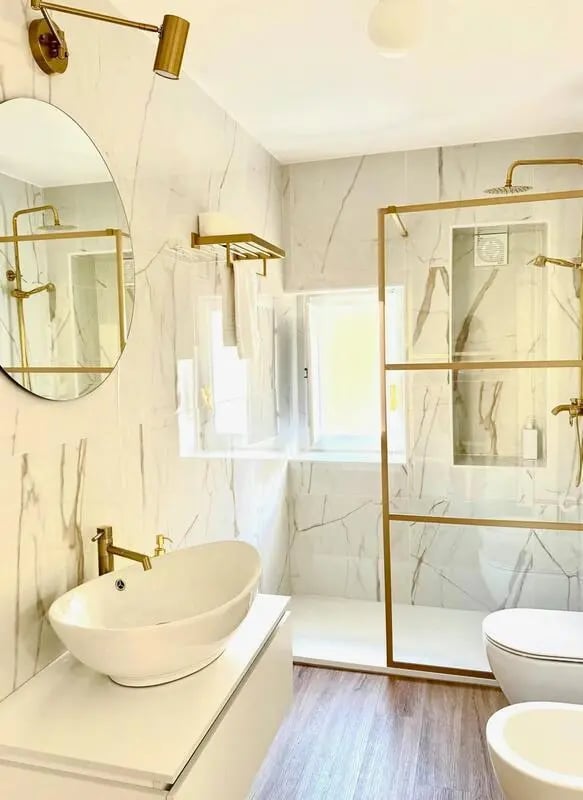 Modern bathroom with oval sink and shower at Welcoming 1-bedroom flat near Pescara Centrale in Pescara Student Accommodation