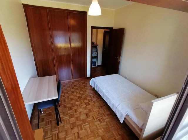 Bed wardrobe desk chair bedroom at Classic Single Bedroom close to João de Deus Metro Station in Vila Nova De Gaia Student Accommodation