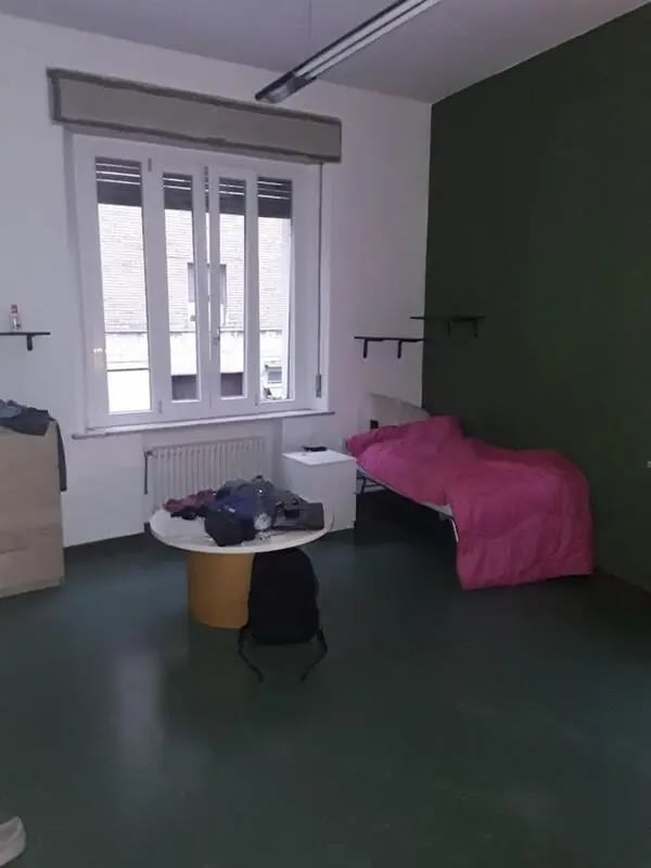 Bed table and window bedroom at Single Bedroom in a 4 bedroom apartment in Parma in Parma Student Accommodation